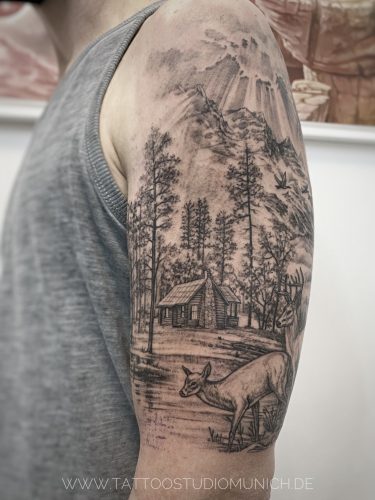 oberarm tatoo